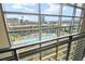 Poolside view from upper level, showing lounge area and city skyline at 353 E Bonneville Ave # 311, Las Vegas, NV 89101