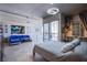 Modern condo featuring an open floorplan that combines the bedroom, living room, and dining area at 353 E Bonneville Ave # 905, Las Vegas, NV 89101