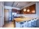 Contemporary kitchen with stainless steel appliances, granite countertops, and breakfast bar at 353 E Bonneville Ave # 905, Las Vegas, NV 89101
