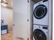 Laundry area with stacked washer and dryer units, adjacent to a convenient storage and utility room at 353 E Bonneville Ave # 905, Las Vegas, NV 89101