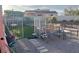 Backyard features artificial grass, benches, seating, and metal and chain-link fencing at 441 Daylin Ct, Henderson, NV 89015