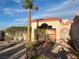 Inviting home entrance with gated access and a lush garden, creating a welcoming and secure ambiance at 441 Daylin Ct, Henderson, NV 89015