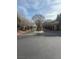 Gated community entrance featuring mature landscaping and architectural details offering security and curb appeal at 4650 Ranch House Rd # 64, North Las Vegas, NV 89031