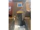 Charming home exterior featuring a secure metal screen door and inviting front entrance at 4650 Ranch House Rd # 64, North Las Vegas, NV 89031