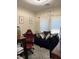 Office space with ergonomic chair, comfortable couch and lots of natural light at 4650 Ranch House Rd # 64, North Las Vegas, NV 89031