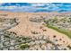 Aerial view of community and golf course nestled in Nevada mountains at 479 Apogee, Mesquite, NV 89027