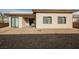 Backyard featuring gravel surface, brick patio, and desert landscaping at 479 Apogee, Mesquite, NV 89027