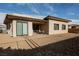 Backyard featuring gravel surface, brick patio, and desert landscaping at 479 Apogee, Mesquite, NV 89027