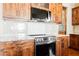 Close up of a gourmet kitchen with modern appliances and custom cabinetry at 479 Apogee, Mesquite, NV 89027