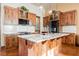 Gorgeous kitchen with custom cabinetry, granite countertops, and modern appliances at 479 Apogee, Mesquite, NV 89027