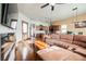 Inviting living room featuring a comfortable sofa and seamless transition to the kitchen at 479 Apogee, Mesquite, NV 89027