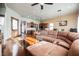 Spacious living room showcasing a comfortable sofa and seamless transition to the kitchen space at 479 Apogee, Mesquite, NV 89027
