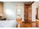 This bedroom has great access to the main bathroom, featuring a large door and a view of the bath at 479 Apogee, Mesquite, NV 89027