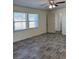 Bedroom with natural light, wood-look floors, and a double window at 5061 E Kellogg Rd, Pahrump, NV 89061