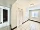 Bedroom featuring tile floor, window, and closet at 520 S 13Th St # D17, Las Vegas, NV 89101