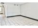 Bright living room featuring tiled flooring and neutral wall colors at 520 S 13Th St # D17, Las Vegas, NV 89101