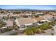 Aerial shot of cozy homes, well-maintained lawns and gardens in a well-planned suburban neighborhood at 580 Kenerly St, Henderson, NV 89015