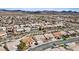 Expansive aerial view of a large, well-planned community with numerous homes and stunning mountain backdrop at 580 Kenerly St, Henderson, NV 89015
