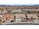 This aerial view captures the beauty of the neighborhood and showcases the home's well-manicured front yard and inviting facade at 580 Kenerly St, Henderson, NV 89015