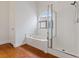 Relaxing bathroom with a soaking tub and a glass-enclosed shower at 580 Kenerly St, Henderson, NV 89015