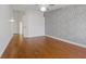 Neutral bedroom featuring hardwood floors and ample natural light at 580 Kenerly St, Henderson, NV 89015