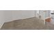 Plush neutral carpet flows from this bedroom into the ensuite bathroom and the hallway beyond at 580 Kenerly St, Henderson, NV 89015