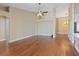 Open living space with hardwood floors and views to the kitchen at 580 Kenerly St, Henderson, NV 89015
