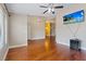 Bright living room with hardwood floors and a modern ceiling fan at 580 Kenerly St, Henderson, NV 89015