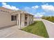 Landscaped backyard with a covered patio, offering an ideal space for outdoor dining and relaxation at 580 Kenerly St, Henderson, NV 89015
