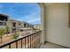 Balcony view showcasing the community picnic and green space at 6261 Dolosonte St, Las Vegas, NV 89113