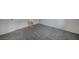 Bedroom featuring gray carpet, white walls and a doorway at 6261 Dolosonte St, Las Vegas, NV 89113
