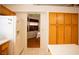 Bright kitchen with ample cabinet space and view into the dining room at 7233 Alsop Ct, Las Vegas, NV 89156