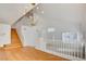 Bright dining room featuring hardwood floors, staircase, and a chandelier at 7337 Tealwood St, Las Vegas, NV 89131