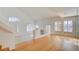 Bright dining room featuring hardwood floors, plantation shutters, and chandelier at 7337 Tealwood St, Las Vegas, NV 89131