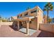 Two-story home with a covered patio and desert landscaping, perfect for enjoying the outdoors at 7337 Tealwood St, Las Vegas, NV 89131