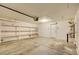 Spacious garage with shelving and ample room for vehicles and storage at 7337 Tealwood St, Las Vegas, NV 89131