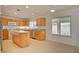 Bright kitchen with an island, tile floors, and ample cabinet space at 7337 Tealwood St, Las Vegas, NV 89131