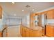 Open kitchen with a large island, stainless appliances, and access to the living area at 7337 Tealwood St, Las Vegas, NV 89131