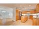 Spacious kitchen features an island, stainless steel appliances, and lots of cabinet space at 7337 Tealwood St, Las Vegas, NV 89131