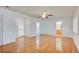 Open living room has ceiling fan, hardwood floors, and is naturally well-lit at 7337 Tealwood St, Las Vegas, NV 89131