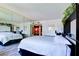 Mirrored bedroom with ample natural light, built-in shelving, and a spacious feel at 750 S Royal Crest Cir # 346, Las Vegas, NV 89169