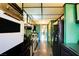 Retro kitchen featuring green walls, black appliances, and unique ceiling paneling at 750 S Royal Crest Cir # 346, Las Vegas, NV 89169