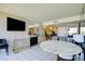 Spacious living room featuring tile floors, fireplace, a large window with bright natural light at 750 S Royal Crest Cir # 346, Las Vegas, NV 89169