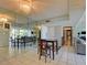Spacious open plan with dining area, tile flooring, and a reflective mirrored wall at 750 S Royal Crest Cir # 346, Las Vegas, NV 89169