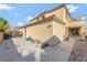Exterior view of the house showcasing the gate to the backyard at 7778 Villa Montara St, Las Vegas, NV 89123