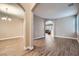 Spacious living room with wood flooring and neutral tones, perfect for entertaining at 823 Safflower Ct, Henderson, NV 89015