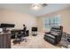 Office space with plush carpet, plantation shutters, a desk, and an oversized reading chair at 823 Safflower Ct, Henderson, NV 89015