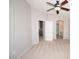 A large ceiling fan highlights this spacious bedroom with neutral walls and plush carpet at 8628 Tomnitz Ave # 101, Las Vegas, NV 89178