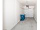 Clean, empty garage with white walls and a concrete floor at 8628 Tomnitz Ave # 101, Las Vegas, NV 89178