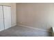 Neutral bedroom with carpet, and a closet with double doors, in a new home at 9325 W Desert Inn Rd # 233, Las Vegas, NV 89117